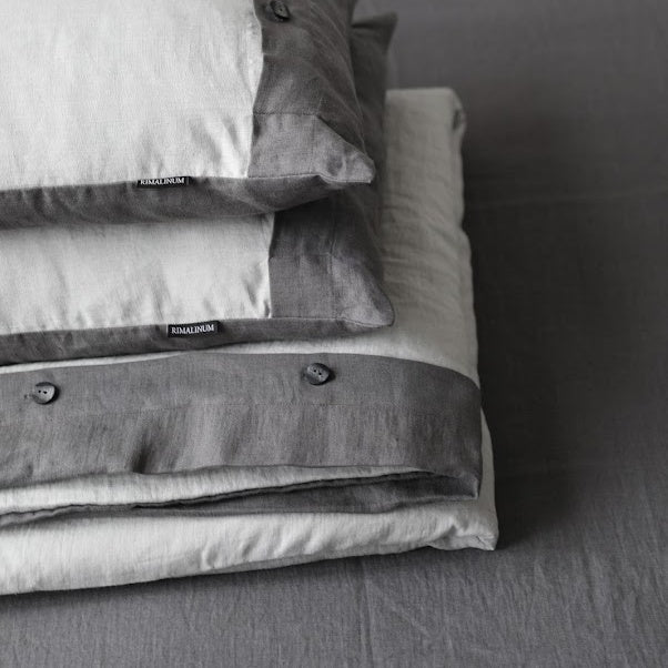 Folded set of two tones linen bedding