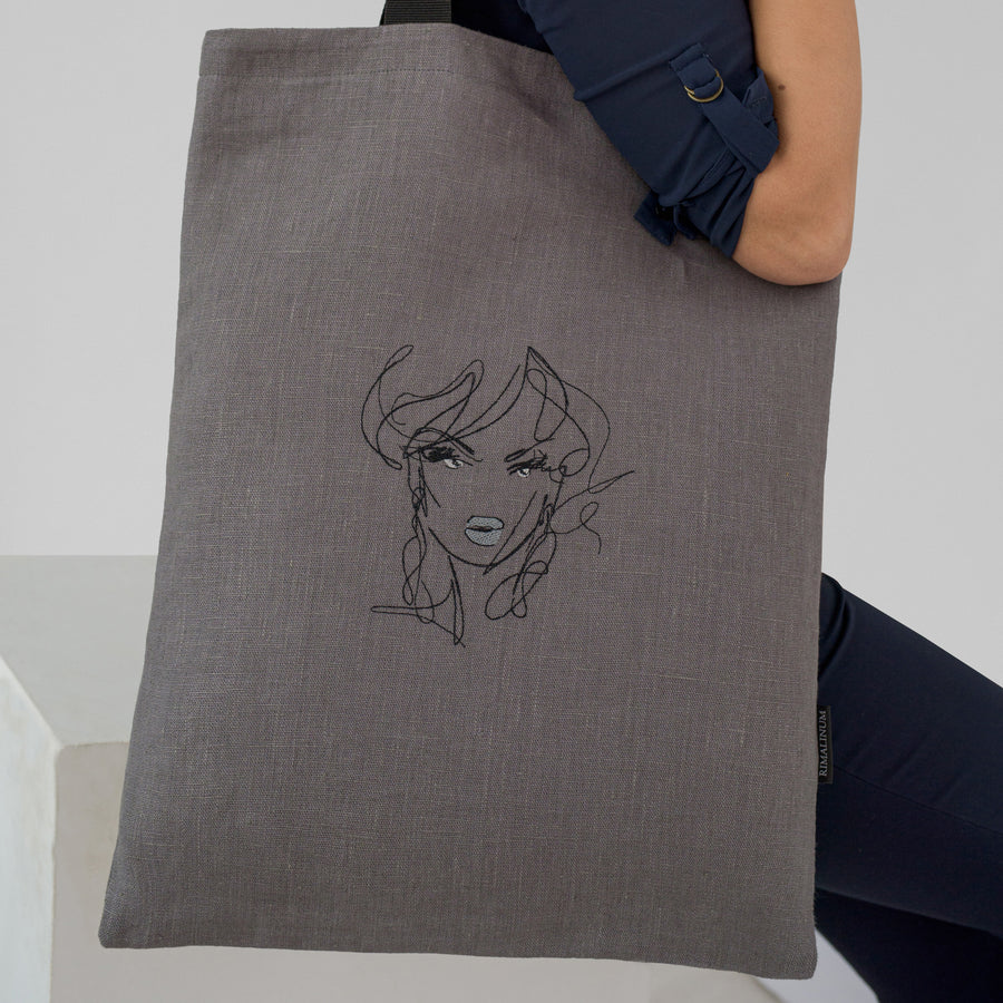 Girl Face Emboidery on a linen tote bag