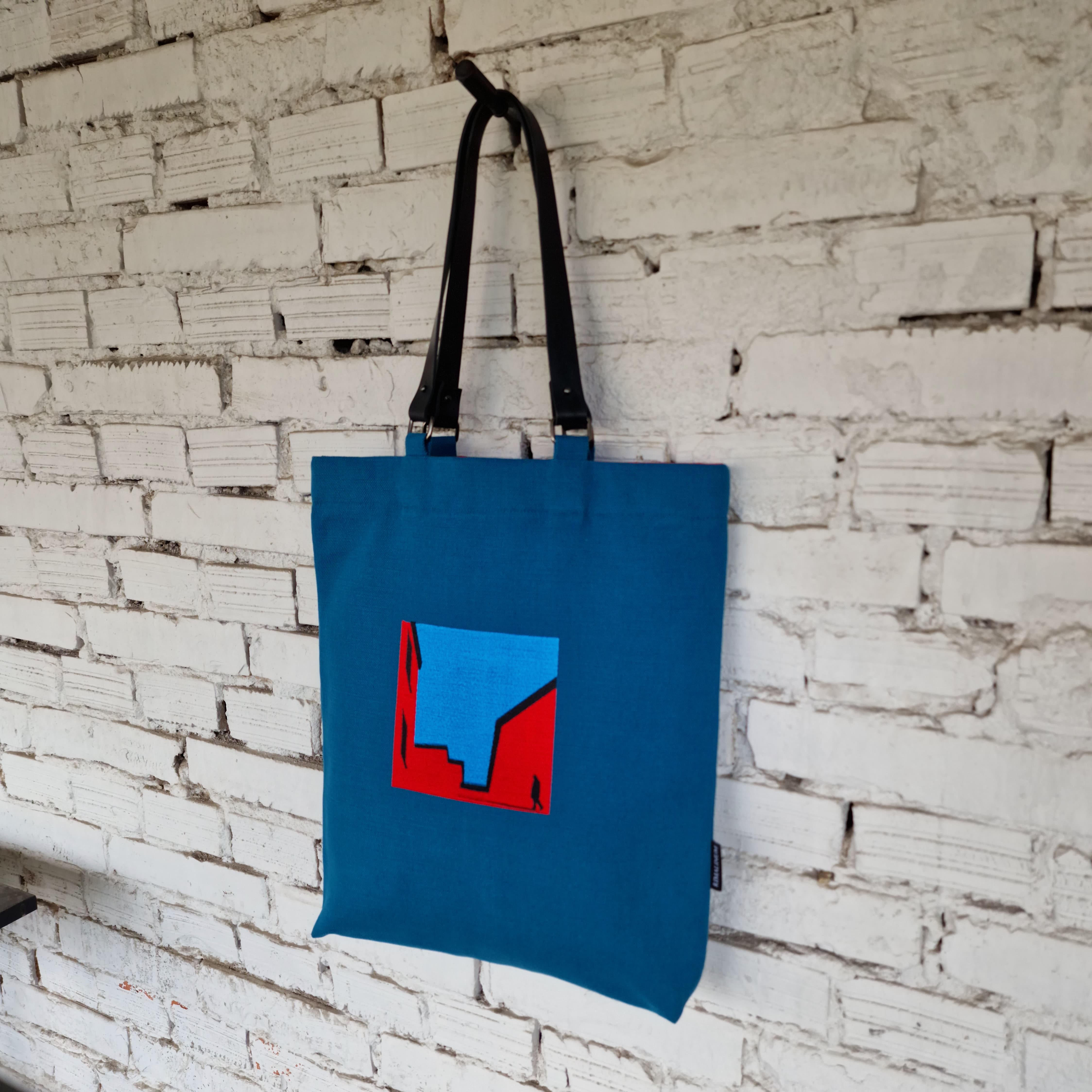 Blue cotton canvas bag with red house and blue sky embroidery