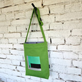 Green linen and cotton canvas crossbody bag with modern embroidery