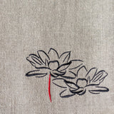 Lotus flower embroidery on a handmade linen bag