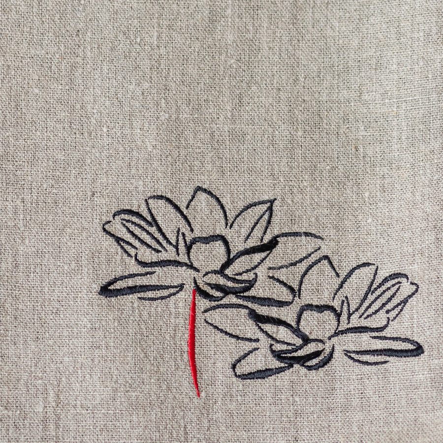 Lotus flower embroidery on a handmade linen bag