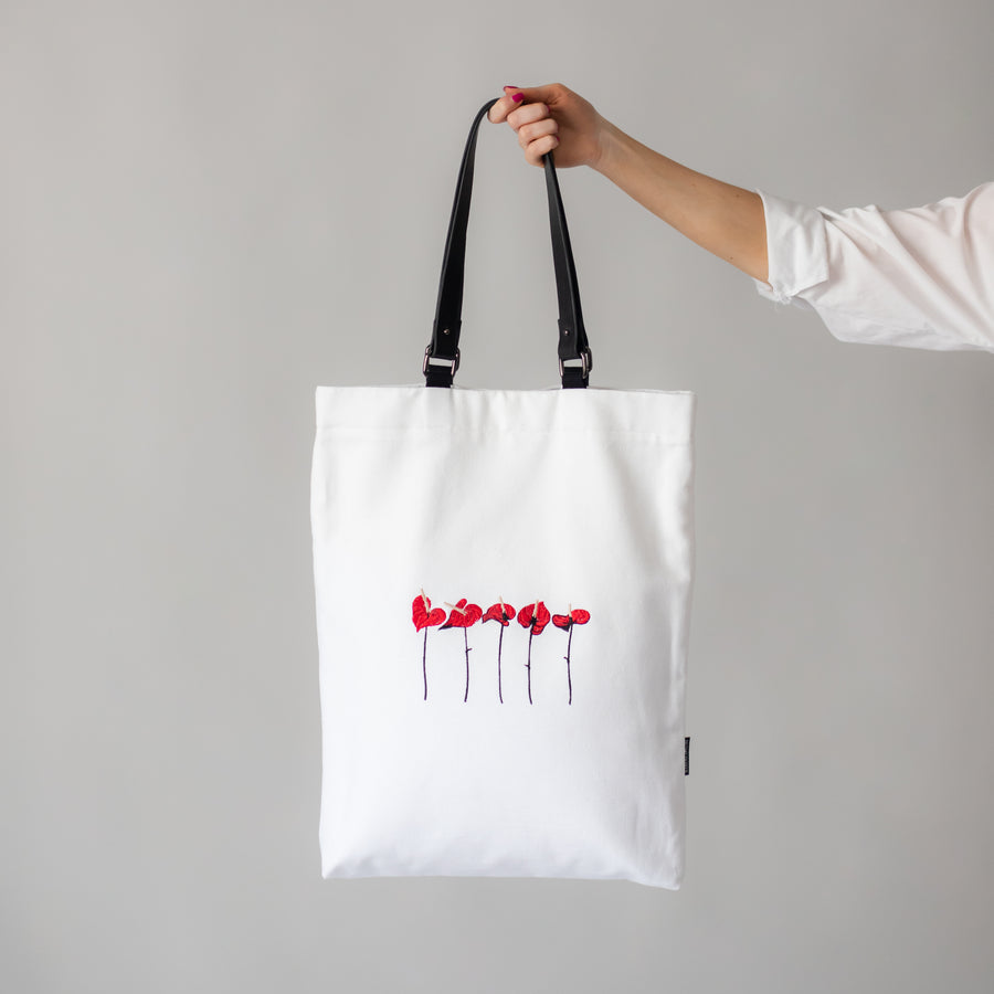 White canvas bag with removable leather handles