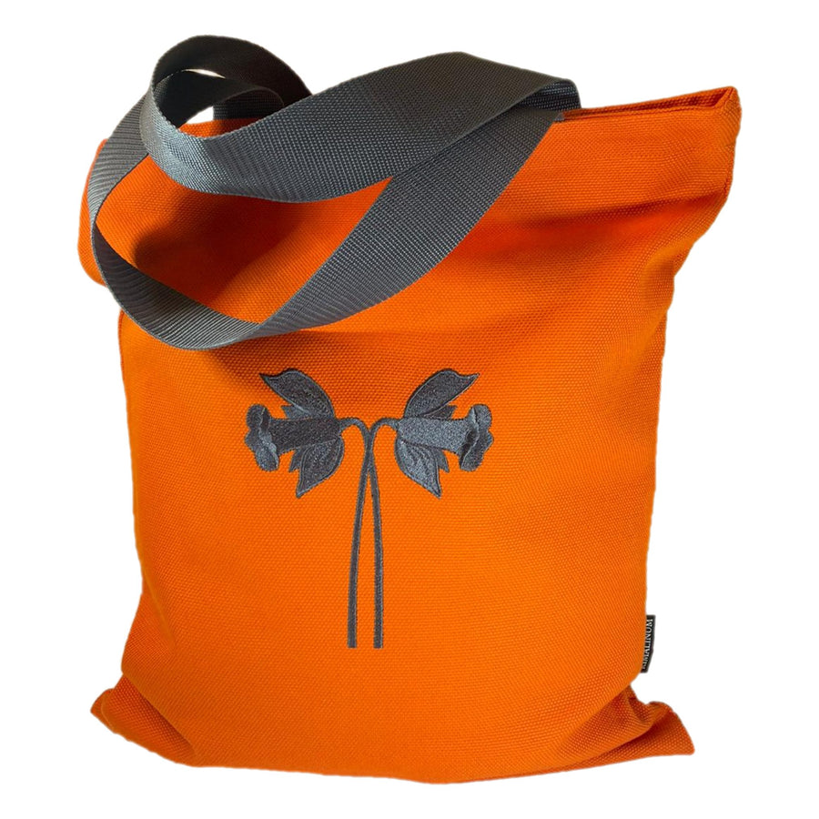 orange cotton canvas tote bag with grey handles and grey daffodil