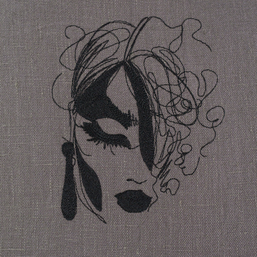 Woman Face embroidery on a linen tote bag